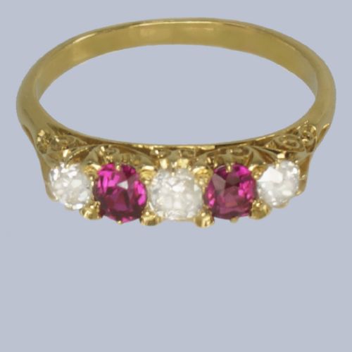 fig 7. An 18ct yellow gold late Victorian five-stone ring featuring alternating oval rubies and old mine cut diamonds set in a claw gallery.