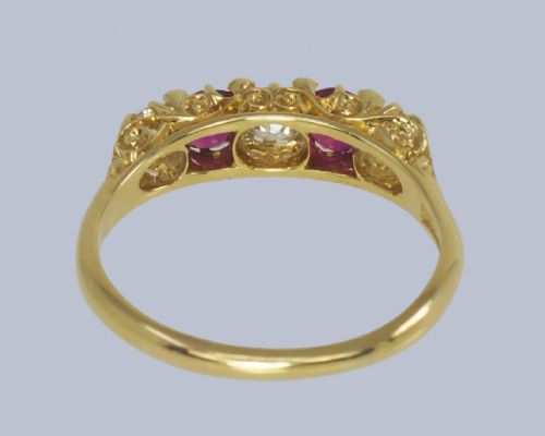 fig 8. An 18ct yellow gold late Victorian five-stone ring featuring alternating oval rubies and old mine cut diamonds set in a claw gallery.