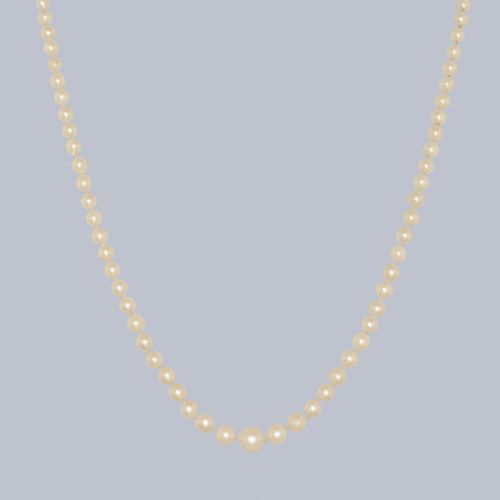 fig 2. A single strand of cream cultured pearls featuring an oval purple amethyst mounted in a 9ct gold clasp surrounded by small pearls.