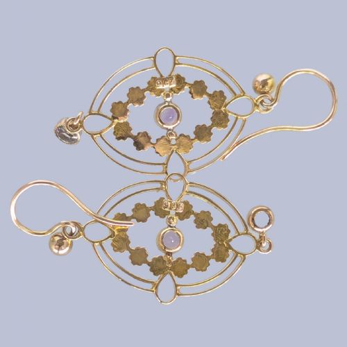 fig 2. A pair of Edwardian 9ct gold drop earrings featuring an openwork oval frame, a central round amethyst, floral details, and a dangling amethyst bottom drop.