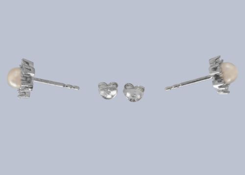 fig 1. A pair of 18ct white gold stud earrings featuring a central cream pearl surrounded by six claw-set diamonds in a floral cluster arrangement.