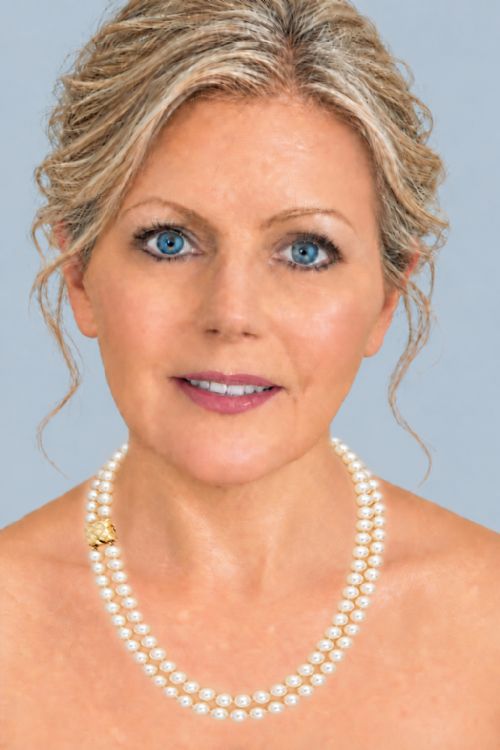 fig 8. A double strand cultured pearl necklace featuring a square textured gold clasp embellished with diamonds.