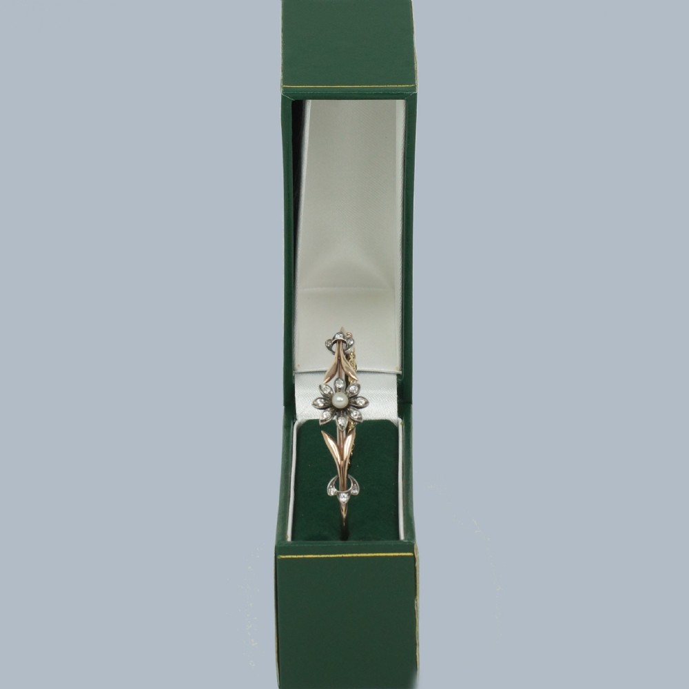 VICTORIAN DIAMOND and PEARL BANGLE 15ct Gold Antique Diamond Floral Bangle circa 1890 View II