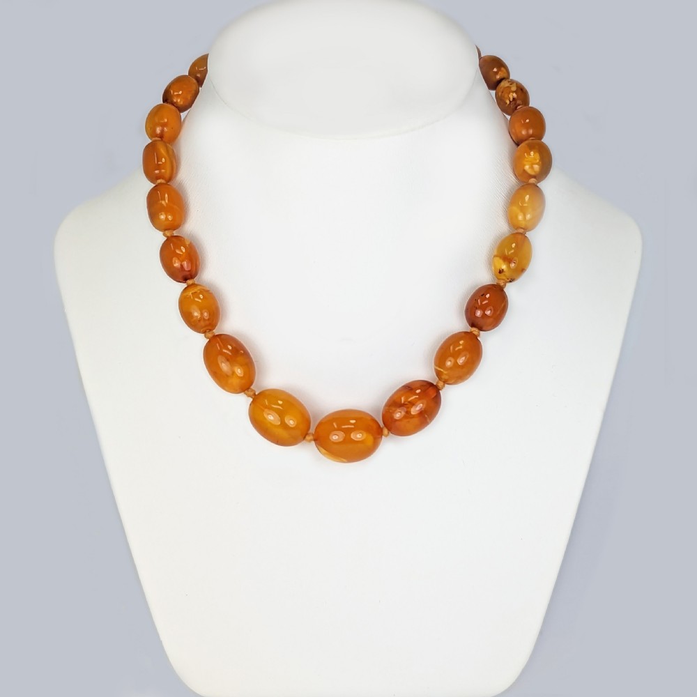 VINTAGE EGG YOKE AMBER NECKLACE 1950s Butterscotch Marbled Amber Bead Necklace View II