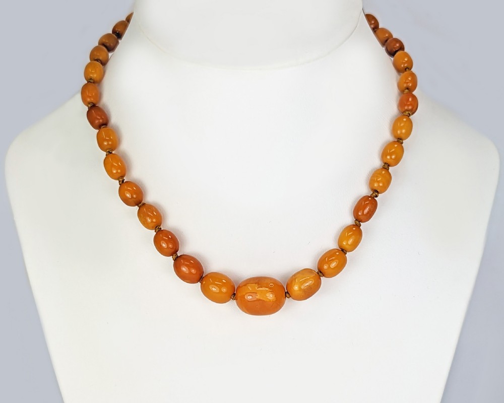 ANTIQUE BUTTERSCOTCH AMBER NECKLACE Single Strand 1930s Egg Yolk Amber Necklace View VI