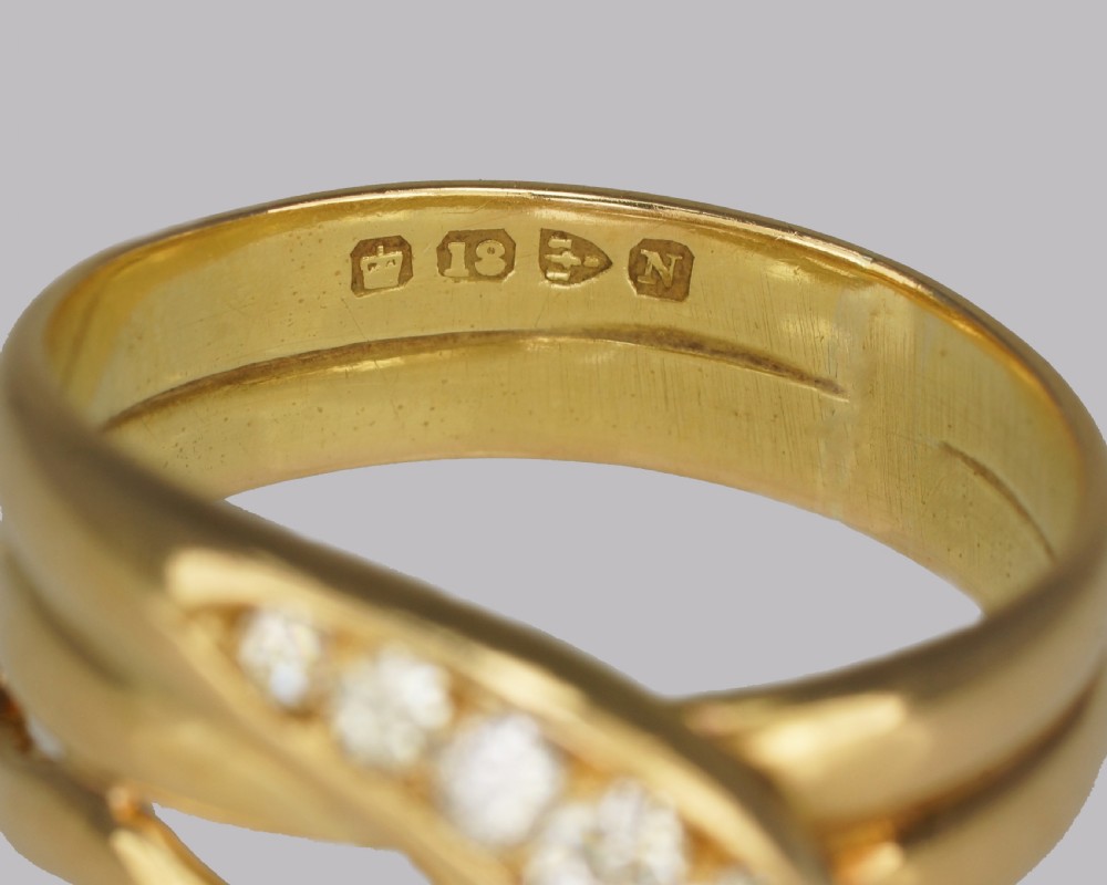 Victorian 18ct yellow gold coiled serpent ring set with five graduated old cut diamonds along the snake head. View IV
