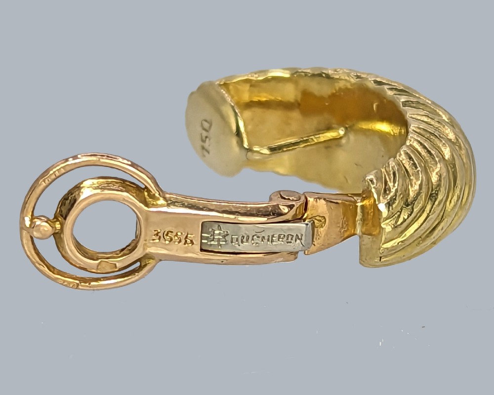 A pair of vintage 18ct yellow gold clip-on hoop earrings featuring a diagonal ribbed texture. View VIII