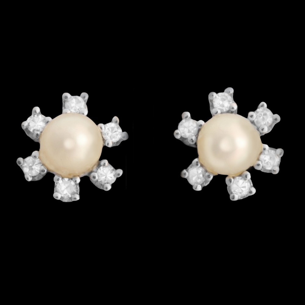 A pair of 18ct white gold stud earrings featuring a central cream pearl surrounded by six claw-set diamonds in a floral cluster arrangement. View VII