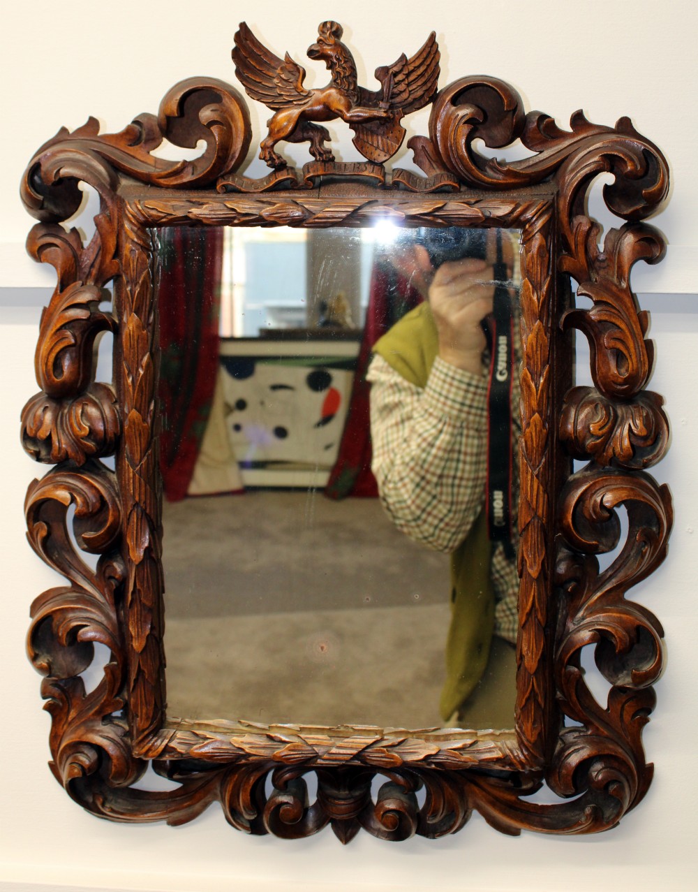 A pair of finely carved walnut  mirrors.  View II