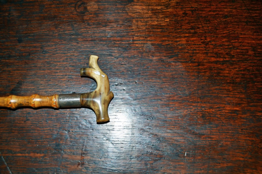 Superb silver mounted Holly child's riding crop View II