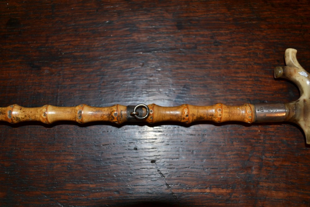 Superb silver mounted Holly child's riding crop View III