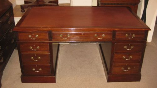 Well Proportioned Mahogany Pedestal Desk in the Classic Victorian Style.