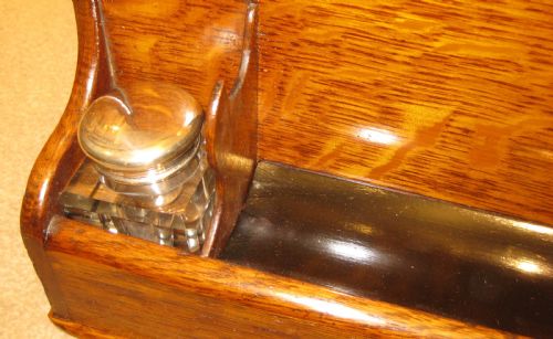 A FINE OAK LETTER RACK WITH TWO GOOD INK BOTTLES - ADDITIONAL PHOTO 1