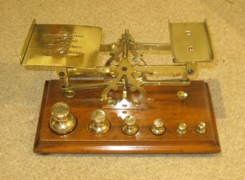 A SPLENDID SET OF WALNUT POSTAL SCALES
