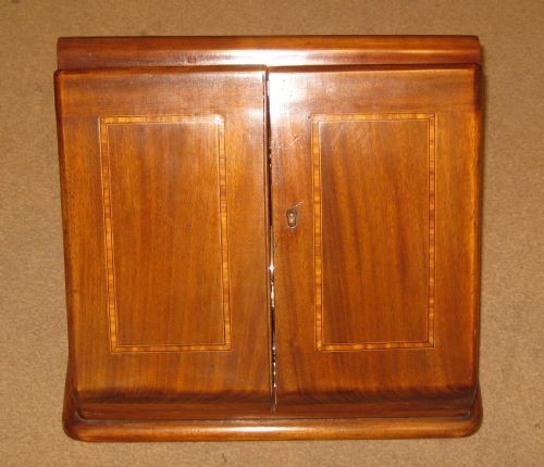 A SPLENDID AND UNUSUAL LATE VICTORIAN INLAID MAHOGANY STATIONERY CABINET