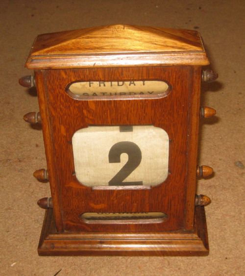 Edwardian Oak Desk Top Perpetual Calendar.