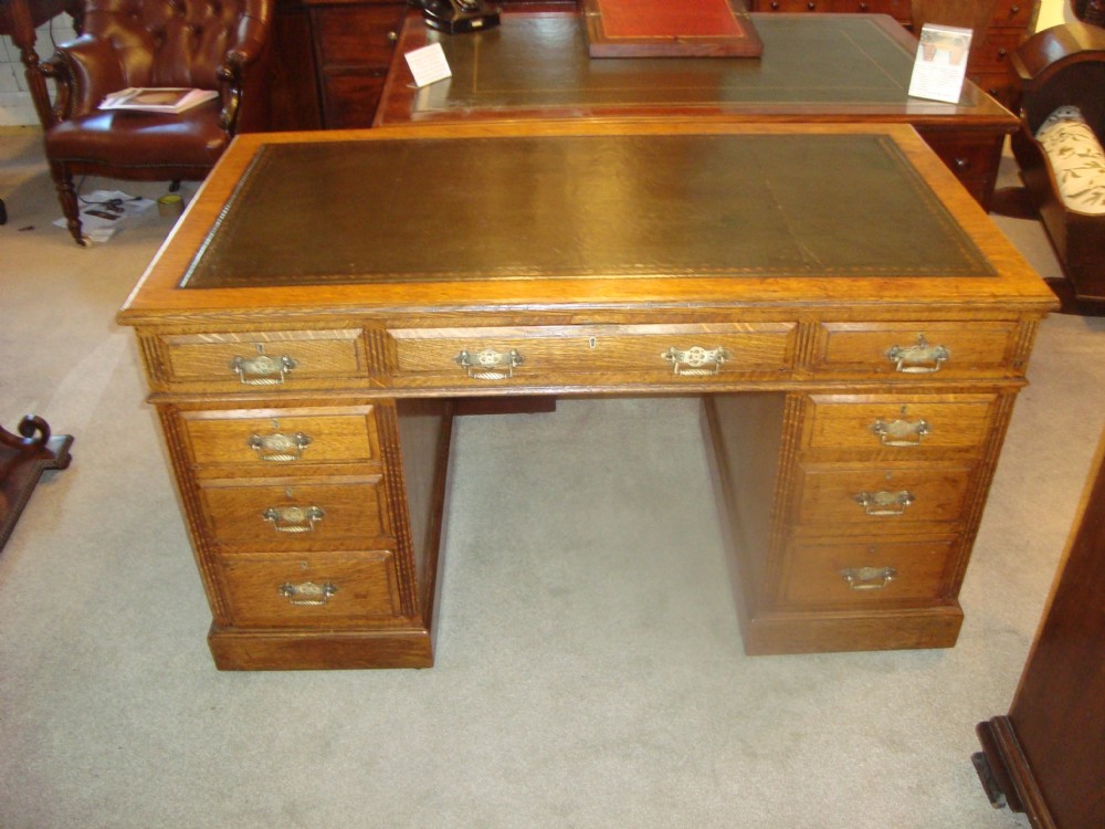 Well proportioned Victorian, solid and golden oak pedestal desk.