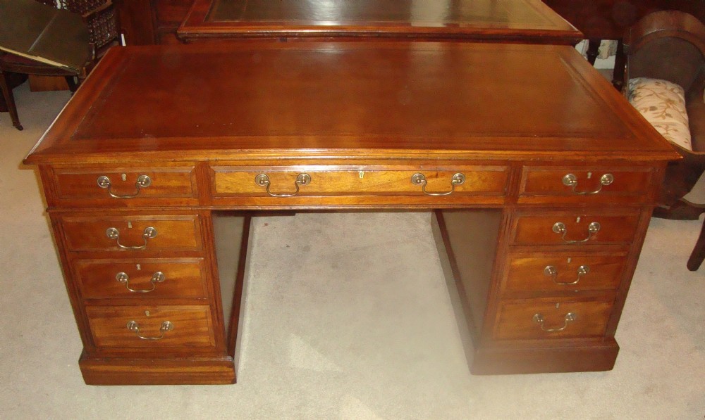 A well made and nicely proportioned, late Victorian, solid mahogany pedestal desk.