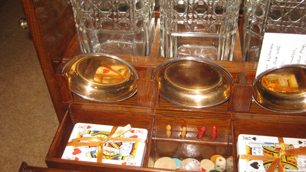 An outstanding Victorian oak, with brass decoration, Decanter box View III