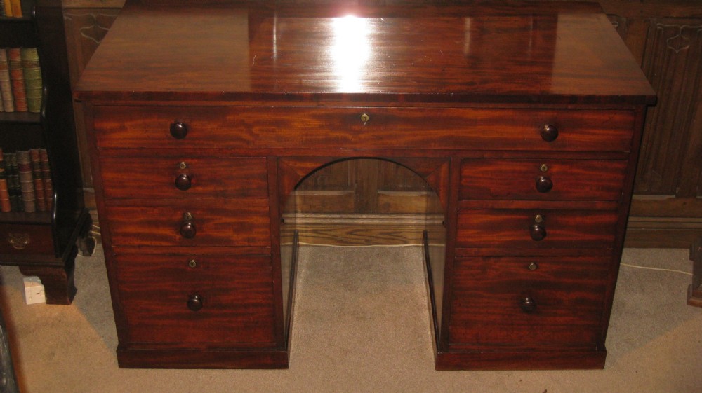 A fine quality early Victorian mahogany knee-hole desk. View IV
