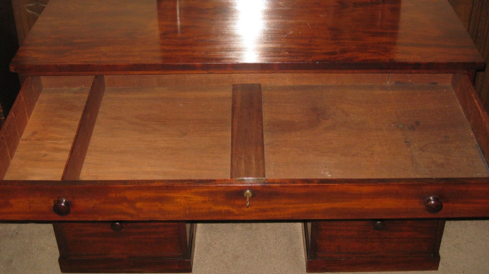 A fine quality early Victorian mahogany knee-hole desk. View VIII