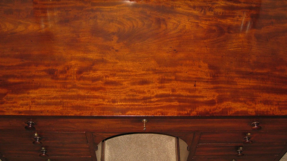 A fine quality early Victorian mahogany knee-hole desk. View IX