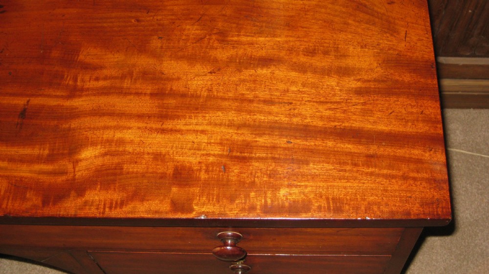 A fine quality early Victorian mahogany knee-hole desk. View X