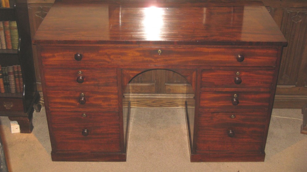 A fine quality early Victorian mahogany knee-hole desk.