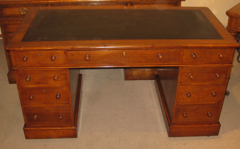 Victorian oak pedestal desk of classic proportions.
