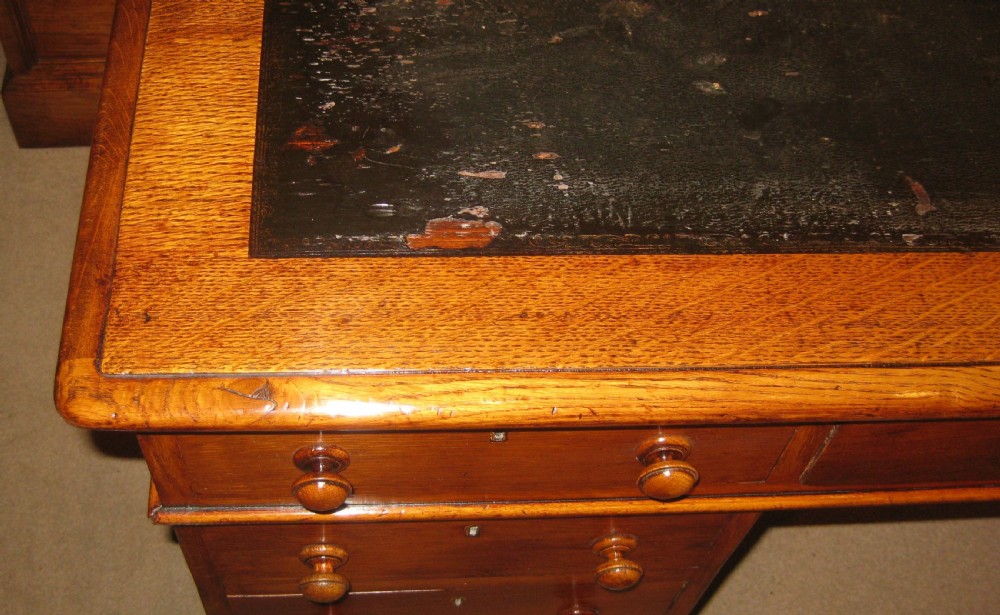Victorian oak pedestal desk of classic proportions. View II