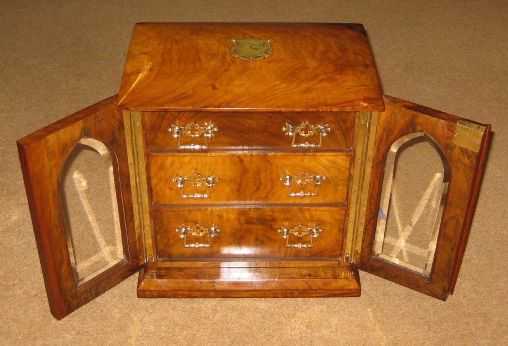 A splendid walnut chest of drawers style jewellery box
