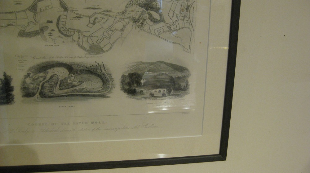 A framed antique monochrome steel engraving illustrating the Course of the River Mole, presented with a wide white mount and a dark wooden frame. View V