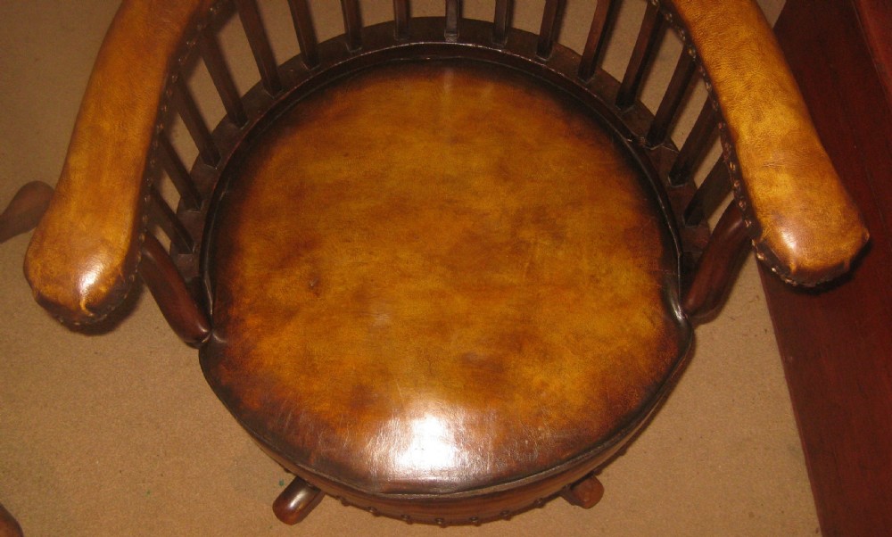 Victorian mahogany revolving desk chair.  View VIII