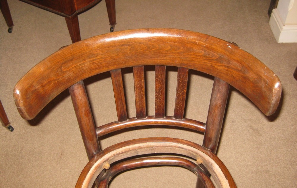 A dark brown steam-bent beechwood side chair featuring a curved backrest and a recessed frame for a drop-in seat pad. View II