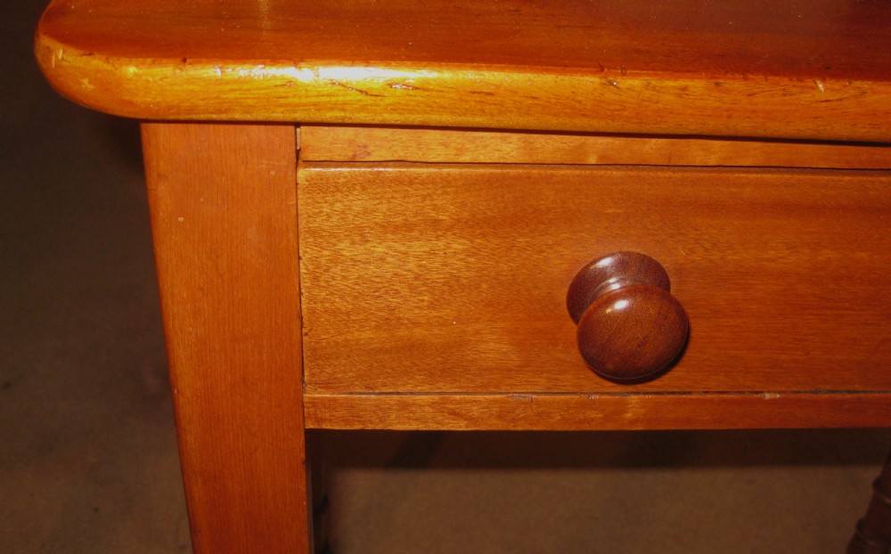 Lovely Victorian golden mahogany side table with single drawer. View IV