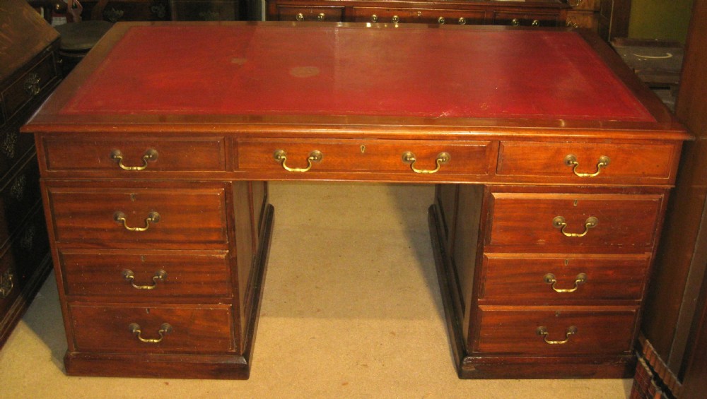 Well proportioned late Victorian mahogany pedestal partners desk