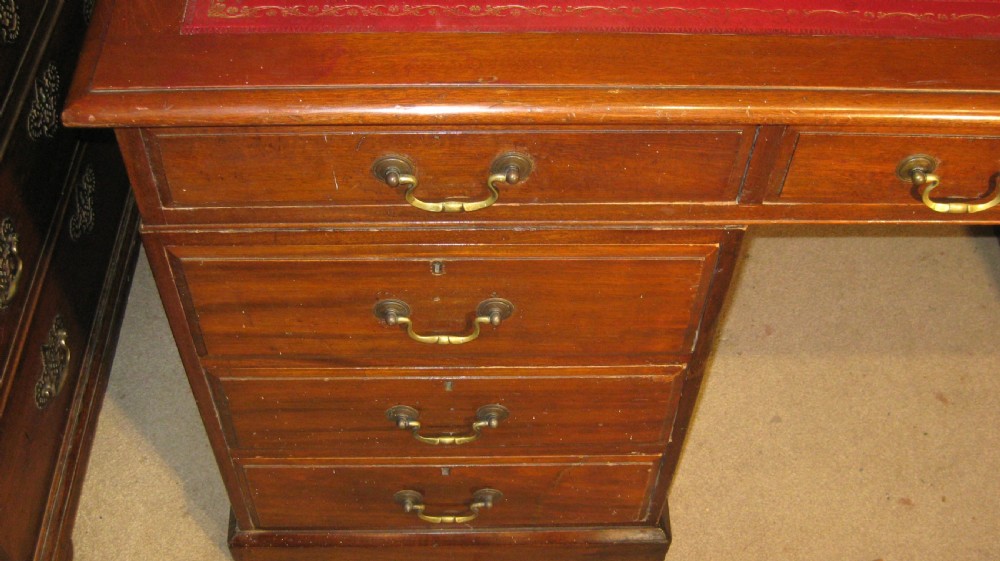 Well proportioned late Victorian mahogany pedestal partners desk View II
