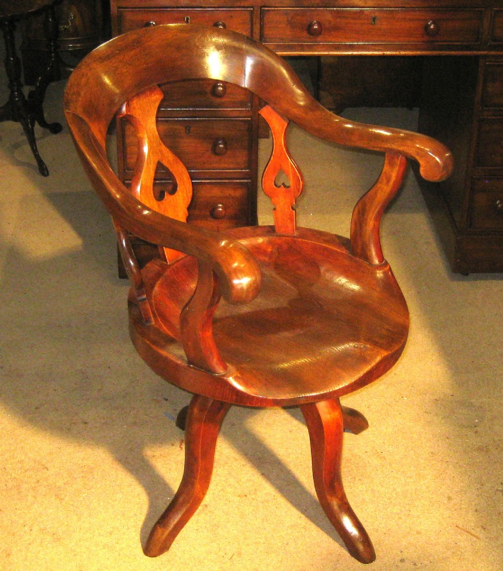 Victorian solid mahogany revolving desk chair. 