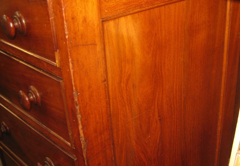 A Victorian mahogany estate managers desk featuring twin pedestal drawers and a fitted upper cabinet with panelled cupboard doors. View XII