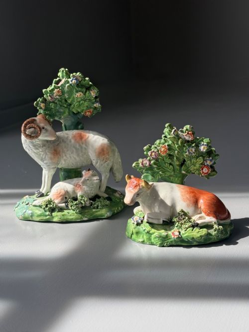 TWO ANIMAL FIGURES STAFFORSHDIRE PEARLWARE C1815 A RAM AND A LAMB AND A COW