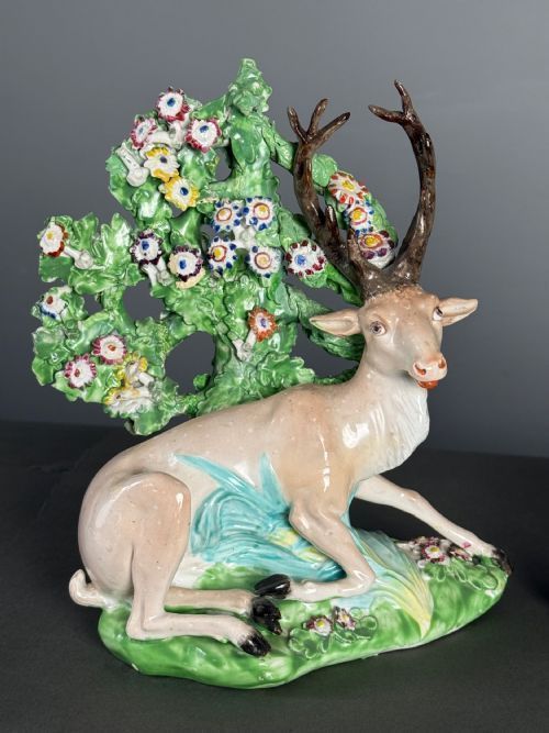PAIR OF LARGE AND FINE GEORGE III DERBY RECUMBENT STAG FIGURES 