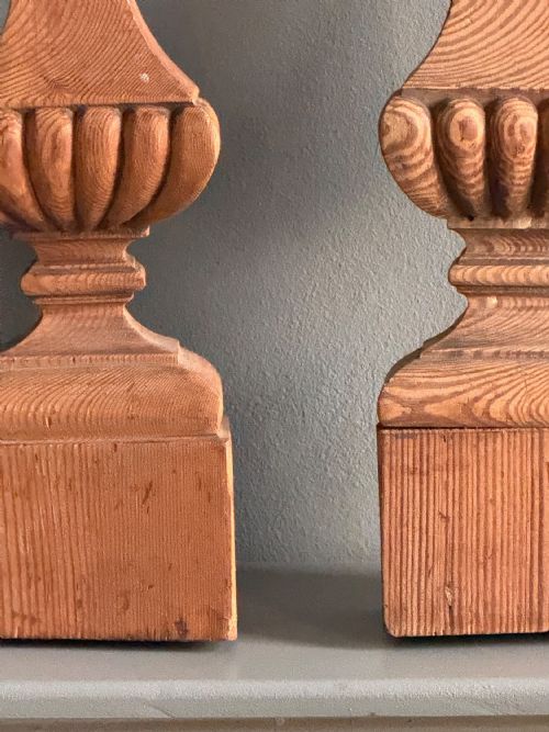 fig 1. A pair of 18th-century pitch pine half balusters with carved gadrooned central knops and flat rear profiles.