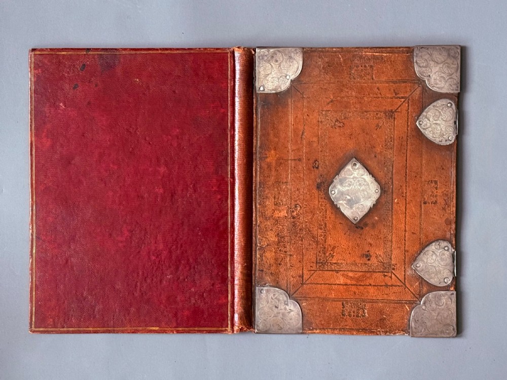 LATE 17TH CENTURY BOOK BINDING / LIBRARY DESK BLOTTER WITH ENGRAVED SILVER MOUNTS 