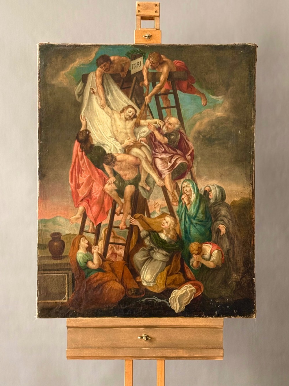 An early nineteenth-century oil painting on canvas depicting the Descent from the Cross with figures in drapery surrounding Christ after a composition by Peter Paul Rubens. View V