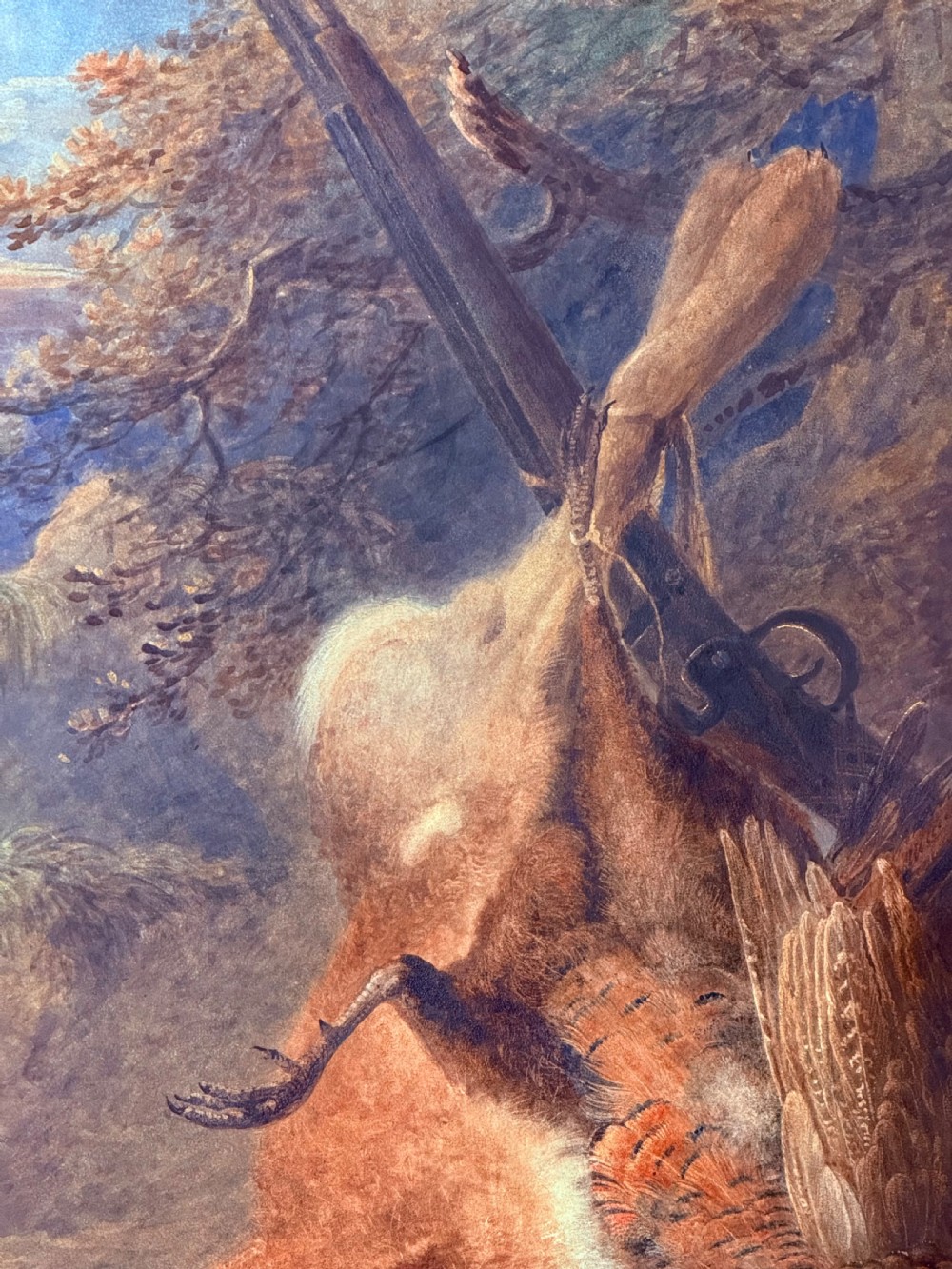 A nineteenth-century watercolour and bodycolour painting depicting a game still life with a hare, pheasant, lapwing, and a shotgun. View III