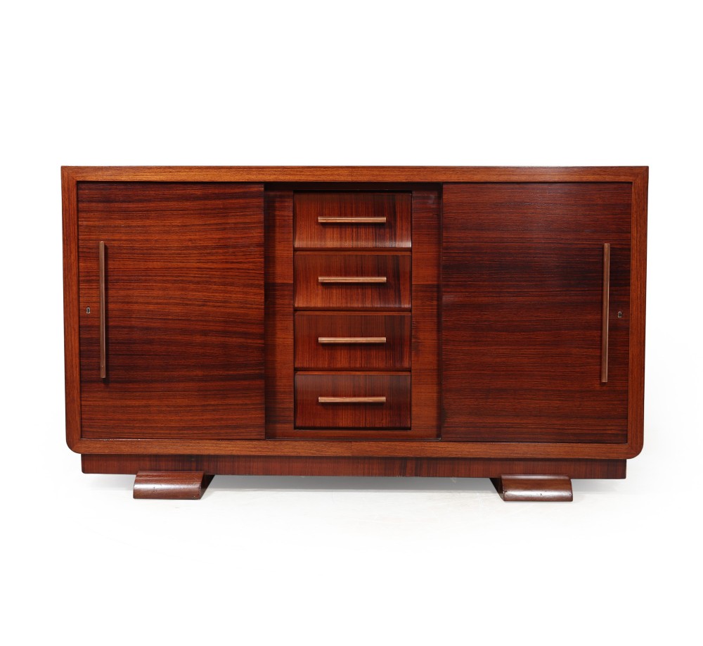 A French Art Deco dark wood sideboard featuring sliding outer doors and a central column of four stacked drawers with horizontal handles.