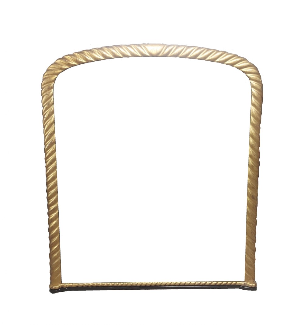 A large 19th-century arch-topped overmantel mirror featuring a gold gilt frame with a pronounced rope twist moulding.