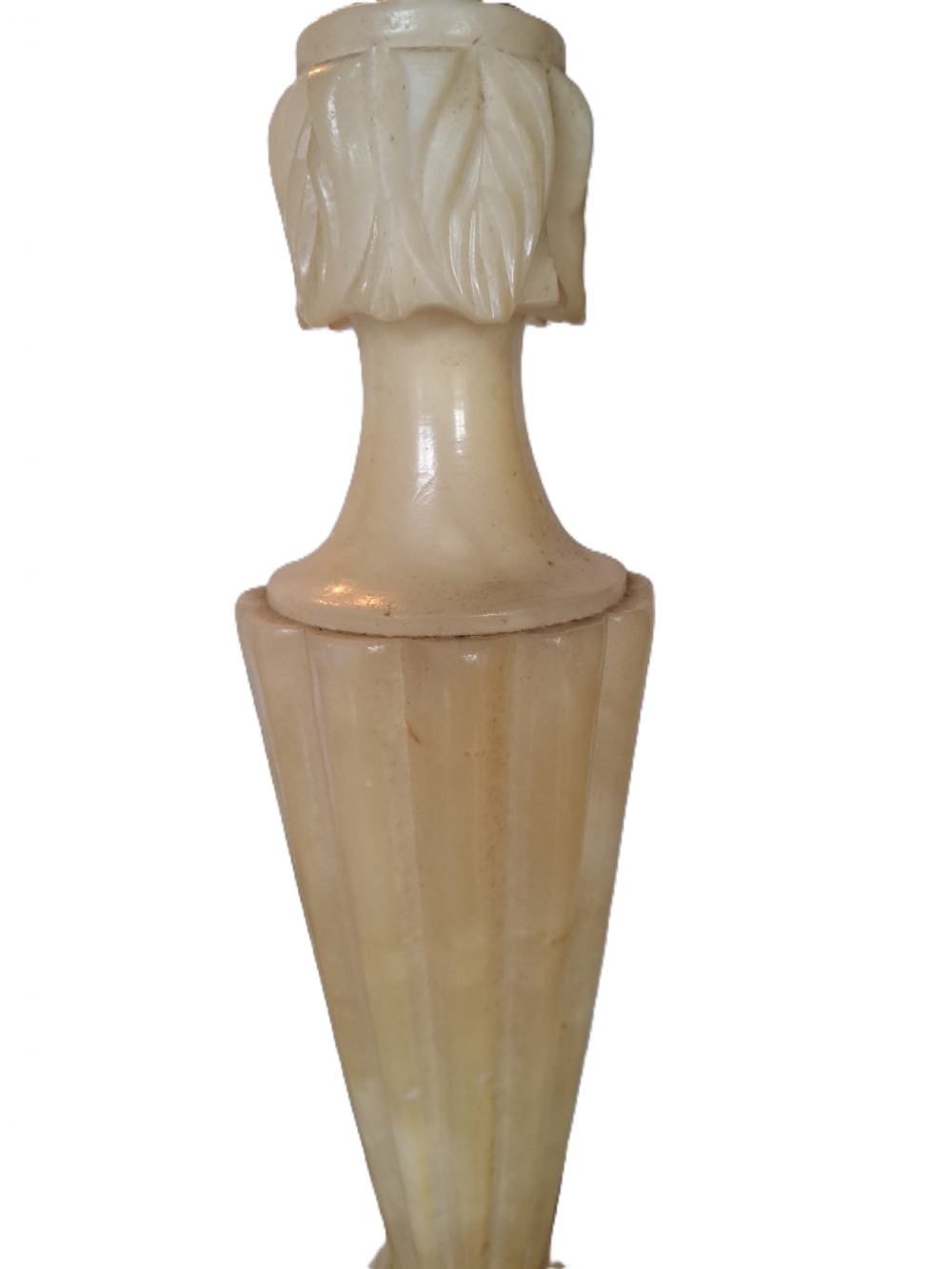 A tall carved cream alabaster table lamp base featuring a square pedestal, a fluted tapered body, carved leaf detailing, and a brass bulb socket. View III