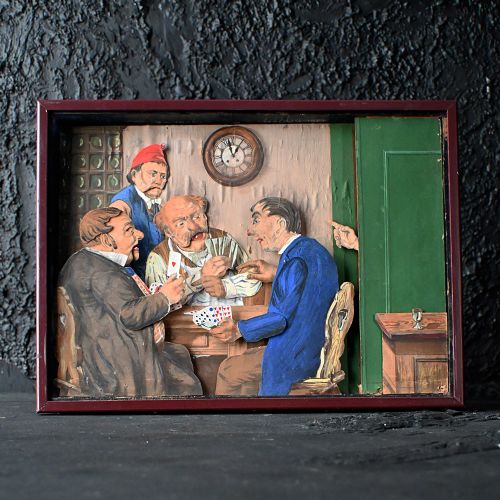 fig 1. An early twentieth-century framed mechanical diorama depicting four men playing cards around a table inside a tavern.