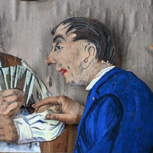 fig 2. An early twentieth-century framed mechanical diorama depicting four men playing cards around a table inside a tavern.